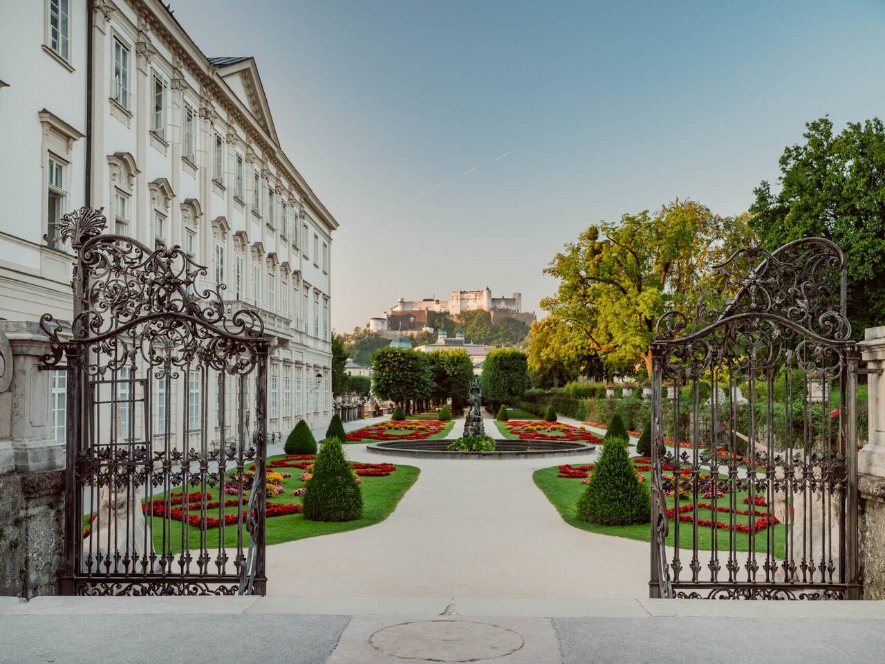 Gates Mirabell Garden with view over Festung Hohensalzburg during sunny wheater