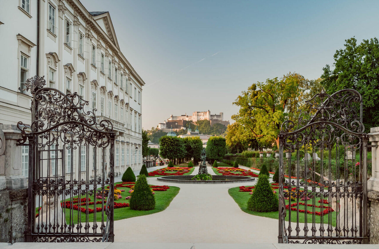 ©TSG Tourismus Salzburg GmbH, Patrick Langwallner Gates Mirabell Garden with view over Festung Hohensalzburg during sunny wheater